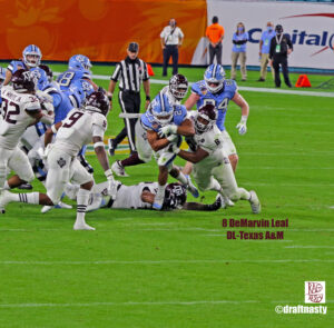 Texas A&amp;M DT DeMarvin Leal tackles UNC RB Josh Henderson