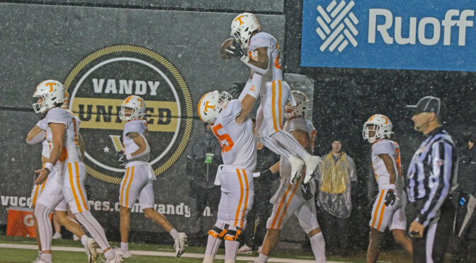 Tennessee freshman RB Dylan Sampson gets lifted up after a TD run