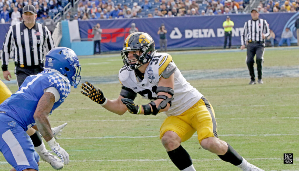 Iowa LB Jack Campbell about to take on the Kentucky running back after blitzing
