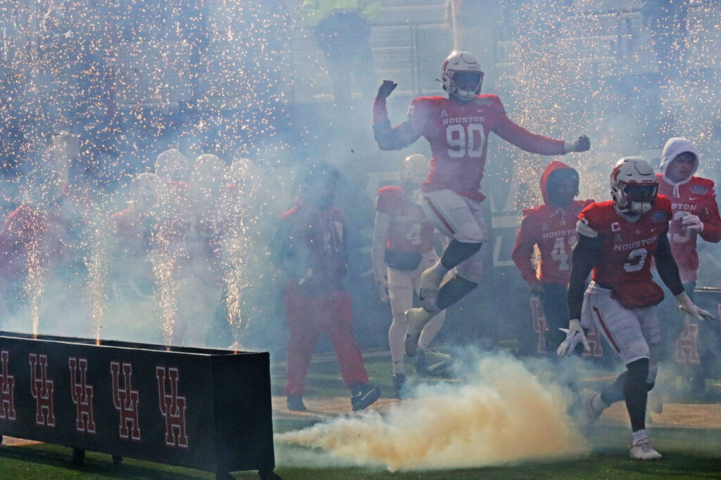 Houston entering the field through the smoke in the 2022 Independence Bowl